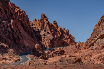 red Aztec Sandstone outcrops, Early Jurassic geological formation of primarily eolian sand. Mouse's Tank Road,Valley of Fire State Park, Clark County, Nevada geology. Weathering. Desert varnish	