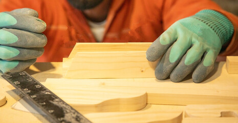 Caucasian craftsman working in a workshop.
