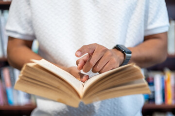  man reading book at home