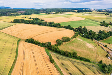 A bird's eye view of agricultural land on a sunny summer day in the Taunus Mountains
