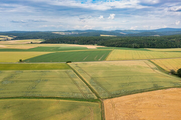 A bird's eye view of agricultural land on a sunny summer day in the Taunus Mountains