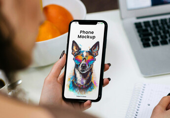 Phone in Woman Hand Mockup