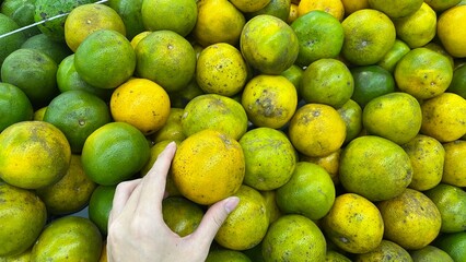fresh local limes in the market