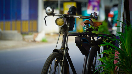 Old Bicycle Parked by Roadside
