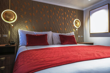 Luxurious mini suite stateroom cabin room onboard luxury cruise ship cruiseship ocean liner with...
