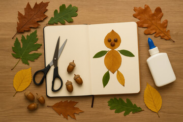 Autumn leaf craft project with scissors, glue, and sketchbook art

