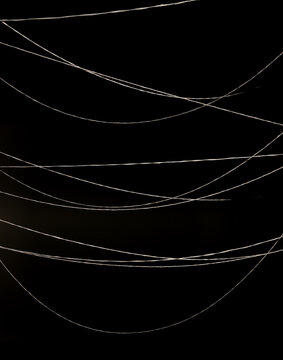 white rope on black background