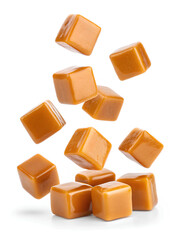 Falling caramel candy cubes isolated on white
