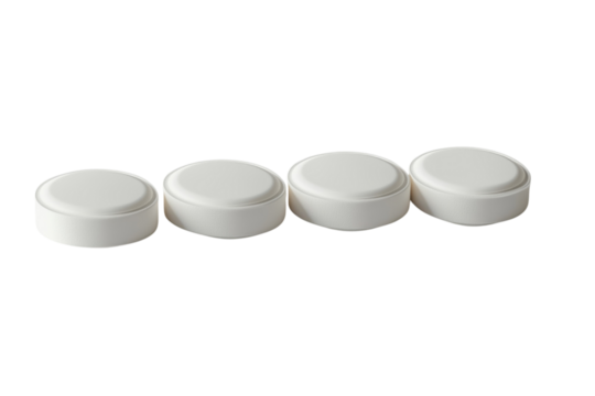 Four white round pill shapes