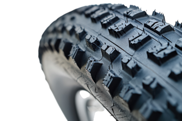 Rugged Traction Close Up View of a Mountain Bike Tire Tread Pattern and Wheel on Black Off on transparent background
