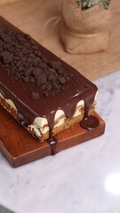 Tiramisu Chocolate Cake with wooden stand