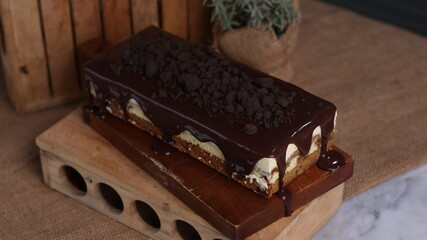 Tiramisu Chocolate Cake with wooden stand