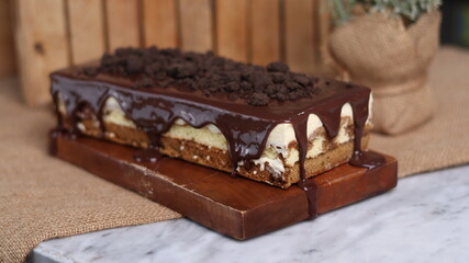 Tiramisu Chocolate Cake with wooden stand