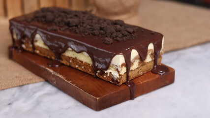 Tiramisu Chocolate Cake with wooden stand