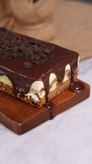 Tiramisu Chocolate Cake with wooden stand