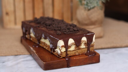 Tiramisu Chocolate Cake with wooden stand