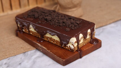 Tiramisu Chocolate Cake with wooden stand