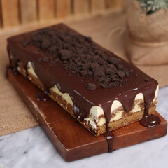 Tiramisu Chocolate Cake with wooden stand