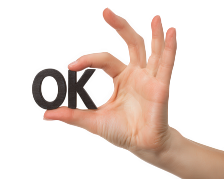 Hand making OK gesture with black object in shape of letters OK against transparent background, conveying positive affirmation