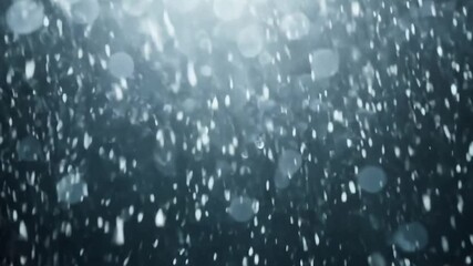 Intense white snowflakes falling heavily against dark background creating mesmerizing winter weather pattern with dense precipitation and atmospheric winter storm conditions with copy space - Powered by Adobe