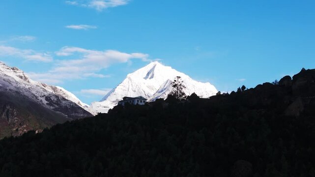 Aerial footage captures the Himalayan range from Namche Bazaar, a key acclimatization village on the Everest Base Camp trek, offering sweeping mountain views and Sherpa cultural landmarks.