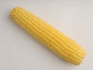Corn cob on white background
