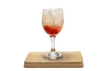 Ice Strawberry soda served on white background on wooden plates.