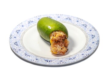 Sticky rice mixed mango put on dish on white background.