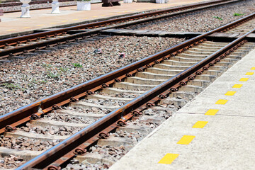 Fototapeta premium Pictures of railroad tracks in Thailand country,concept translation train station.