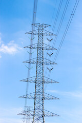 Pictures of High voltage electric pole on blue sky background.
