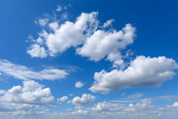 Stunning Blue Sky with Scattered Cumulus Clouds A Breathtaking Nature Photograph