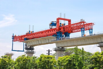 Pictures of crane lifting during building highway bridge construction in concept stations...