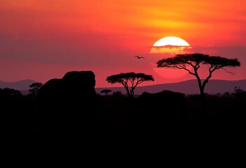African wildlife silhouettes against a sunset safari landscape, grassland, element