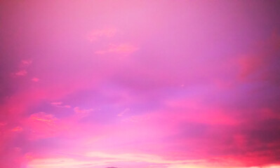 Dreamy pink - purple sky twilight background and sunlight with copy space, clouds soft focus
