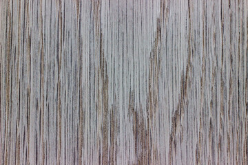 natural wood, with a beautiful pattern. natural gray wood background. wooden board with natural seamless texture. ash tree, view from above, horizontal, close-up.