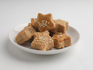 Peanut cookies with star shaped on white background