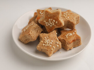 Peanut cookies with star shaped on white background