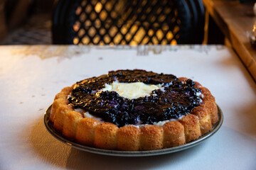 Tyrolean berry pie with blueberries is on the table. taken in close-up with space for text