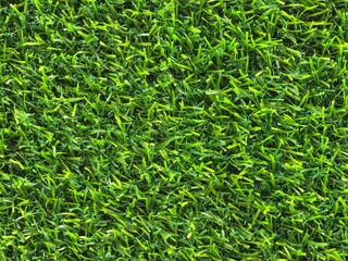 Close-up of Bright Green Artificial Grass Texture