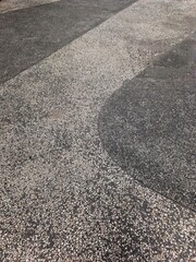 Textured Pavement with Contrasting Dark and Light Aggregate Sections