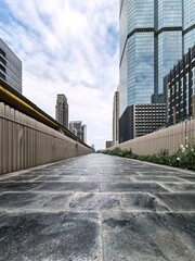 Fototapeta premium Chong Nonsi Canal Park Walkway with Modern Skyscrapers, Bangkok