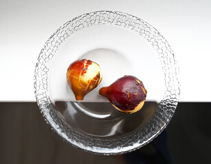 Two Ripe Figs on a Glass Plate – Minimalist Top View