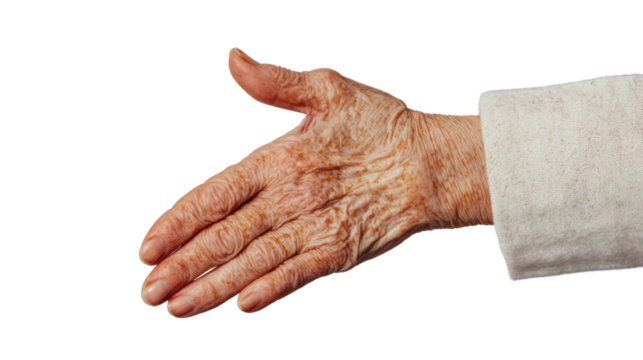 A close-up of an elderly hand reaching out for a handshake against a white background.