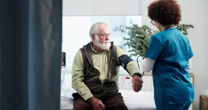 Nurse, old man and blood pressure test in hospital for healthcare checkup, hypertension and exam. Consultation, professional and monitor heart wellness of elderly patient for cardiovascular health