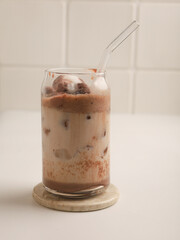 Iced coffee with ice cream float in a glass