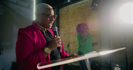 Dynamic pastor delivering a heartfelt message at a podium during a church service, with...