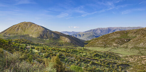 beautiful mountain landscape with hill and peaks in the background in the region of Konispol Markat Albania