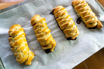 Puff pastry with chocolate and strawberries. Baking. Dessert. Dough.