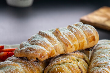 Puff pastry with chocolate and strawberries. Baking. Dessert. Dough.