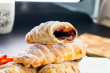 Puff pastry with chocolate and strawberries. Baking. Dessert. Dough.